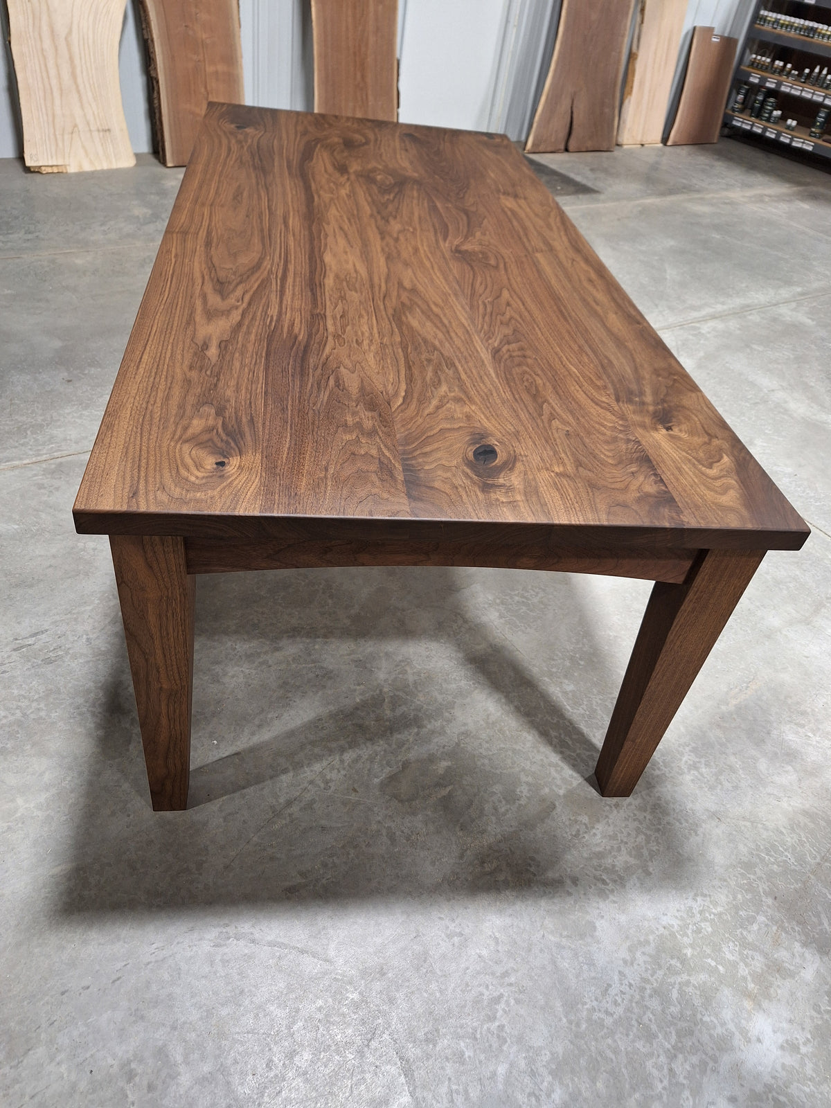 Solid walnut farmhouse dining table top showing the grain of the walnut boards