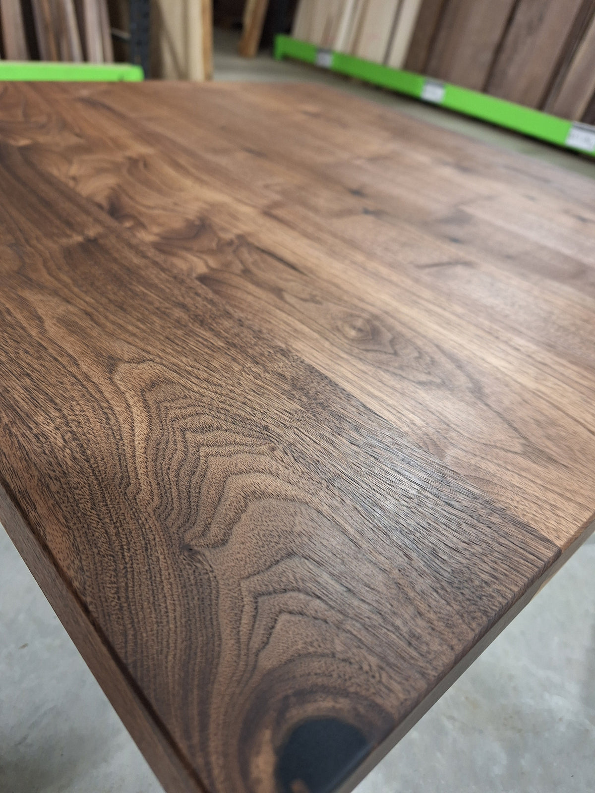 Close-up of walnut grain on a coffee table top