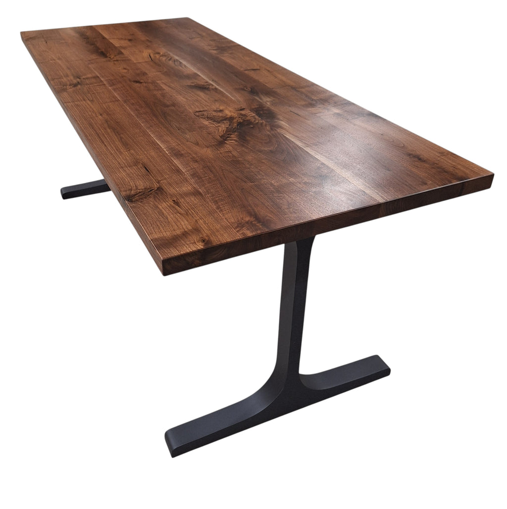 Solid walnut dining table with black metal T-base legs