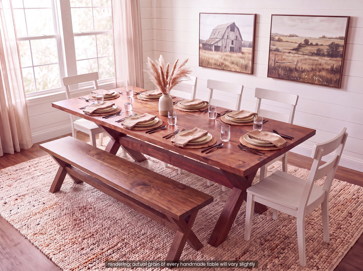 Walnut trestle dining table with matching bench and white chairs, set for dinner (rendering)